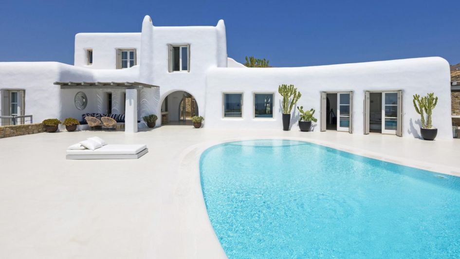 The traditional Greek villa and stunning outdoor luxury pool in Mykonos at Villa Agave, one of the best Greek Island villas.