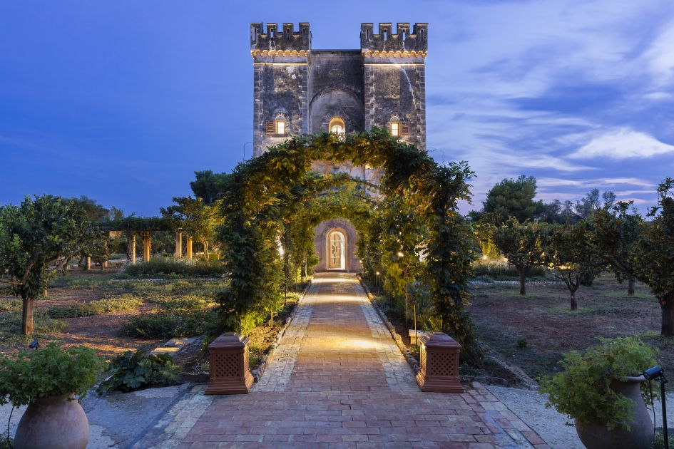 Fortress of Le Grand Jardin, a luxury villa in France, at night.
