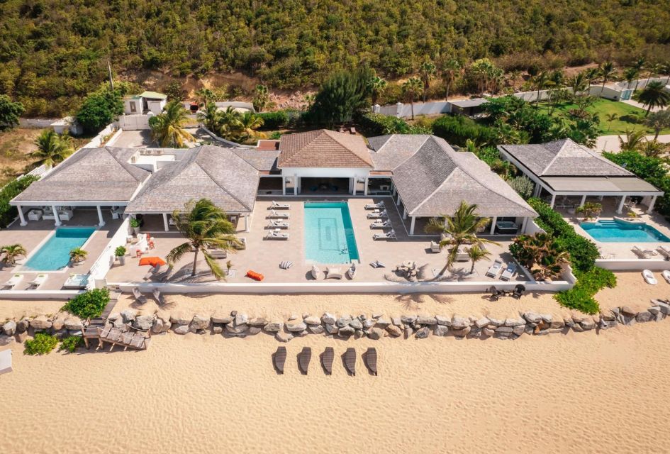 Villa La Perla Palais, Saint Martin Beachside view of Villa La Perla Palais, a luxury villa with a pool in Saint Martin in the Caribbean. 3 swimming pools, steps from the beach, and a whole luxury villa to enjoy...
