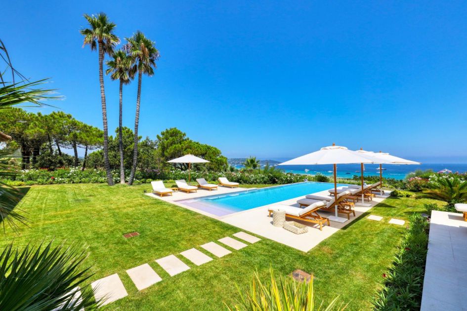 Vibrant green gardens, a large infinity pool and clear blue skies characterise life at this luxury St Tropez villa.