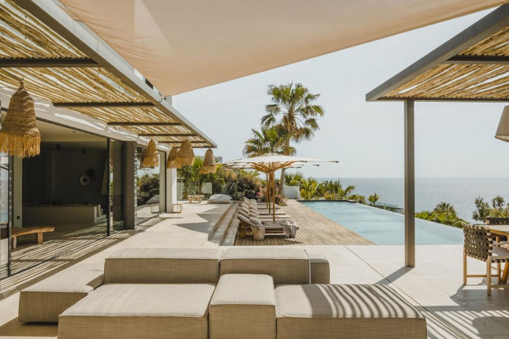 Villa Nereo, Ibiza In typical Bohemian style, Villa Nereo eases guests to experience 'slow Ibiza'. The extensive terrace is perfect for chill afternoons, featuring an impressive outdoor pool, loungers, seating areas and 180-degree sea views!
