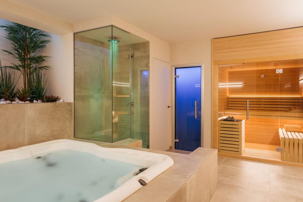 Oliveto Estate, Le Marche Oliveto Estate in Le Marche poses as one of the best wellness villas in Italy, thanks to indulgent facilities from not one, but two properties! The sumptuous spa area can be seen pictured here, featuring an indoor Jacuzzi, Hammam, sauna and emotional shower.