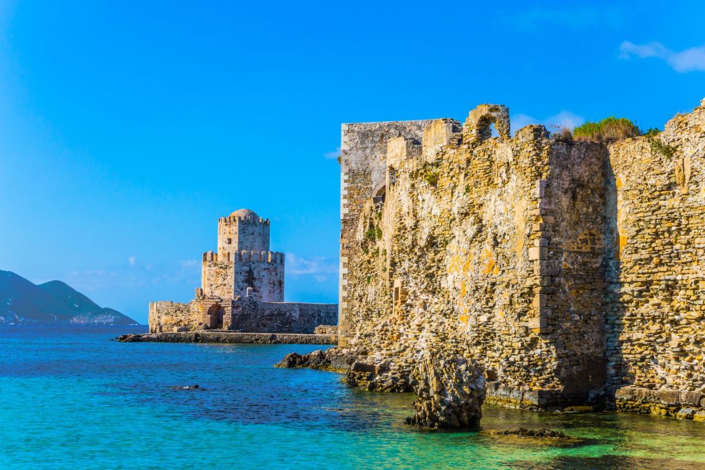 Methoni Castle, Peloponnese. Copyright - kavram @ canva.com Photo of Methoni Castle accompanied by the clear ocean and blue skies. Filming for The Odyssey took place in the Messinia region of the Peloponnese, with Methoni Castle thought to have been used as one of filming locations in The Odyssey.